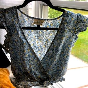Floral casual dressy with yellow flowers, low V cut, simple pretty top.